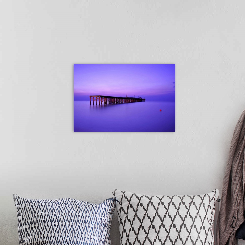 A bohemian room featuring Sunrise colors of sunny isle beach fishing pier in Miami Dade County, Florida.