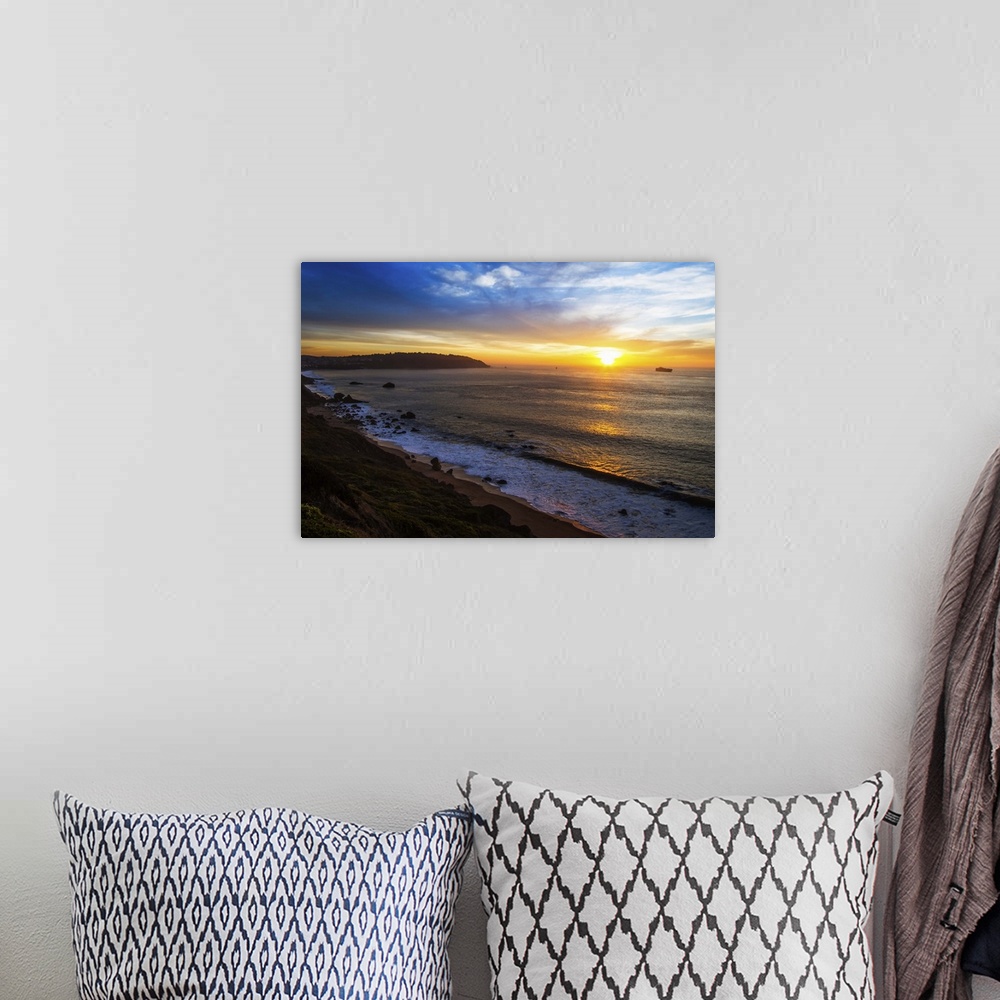 A bohemian room featuring Sunset at San Francisco Bay, America, United States, coastline.