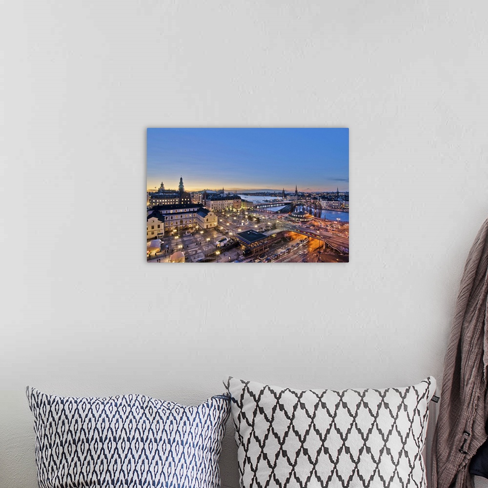 A bohemian room featuring This is a view over Slussen which is the main traffic central of the island of Sdermalm. The gree...