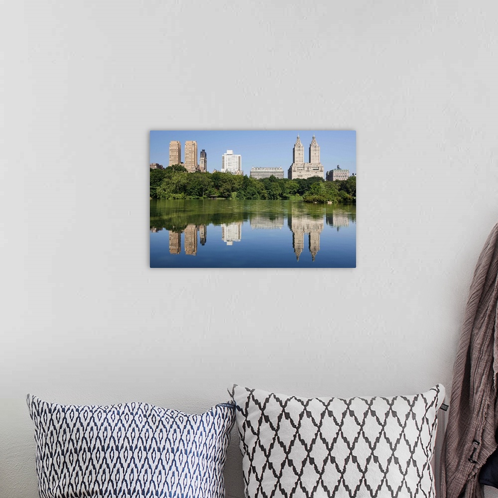 A bohemian room featuring San Remo Apartments and other buildings on Central Park West, viewed from The lake in Central Par...