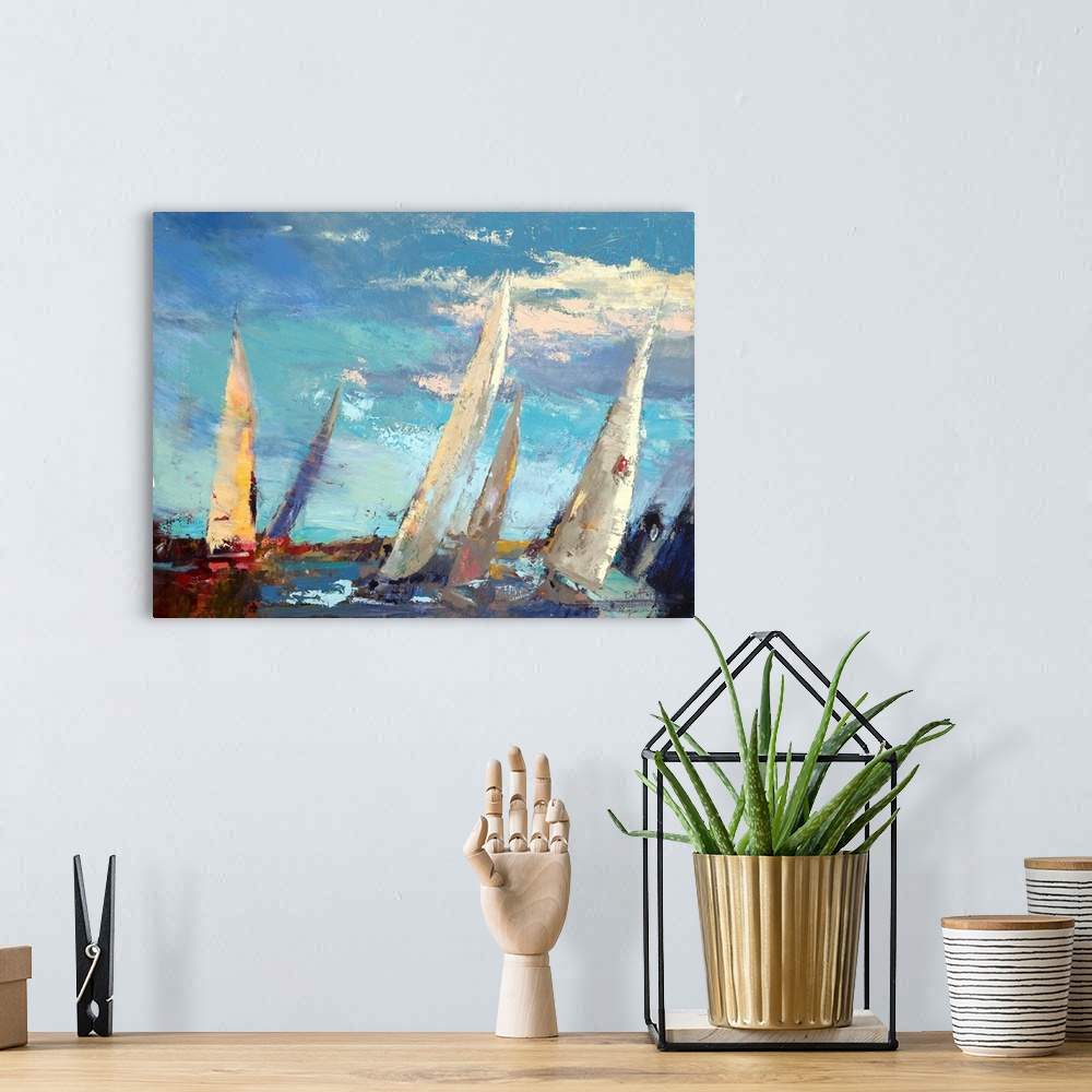 A bohemian room featuring A contemporary coastal themed painting of sailboats sailing the open sea.
