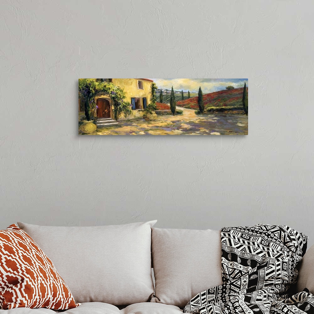 A bohemian room featuring Fine art oil painting landscape of a Tuscan farmhouse with hills of red rising in the background ...