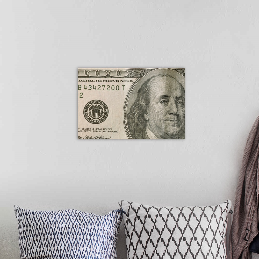A bohemian room featuring Portrait of Benjamin Franklin on the one hundred dollar bill.