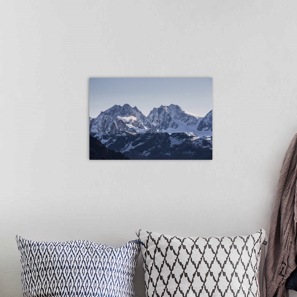 A bohemian room featuring View of the snowy peak Bernina and peak Roseg at summer, Malenco Valley, Valtellina, Province of ...