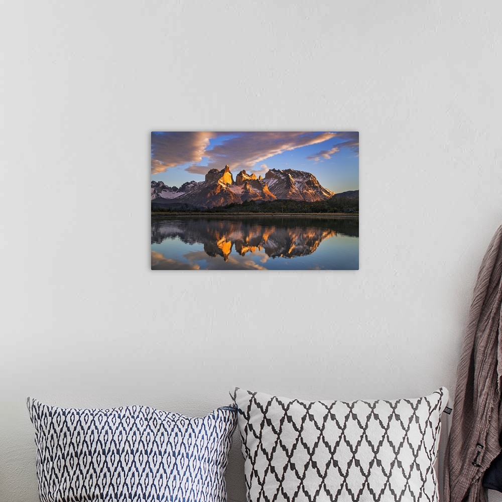 A bohemian room featuring Chile, Torres del Paine, Magallanes Province. Sunrise over Torres del Paine reflected in the wate...