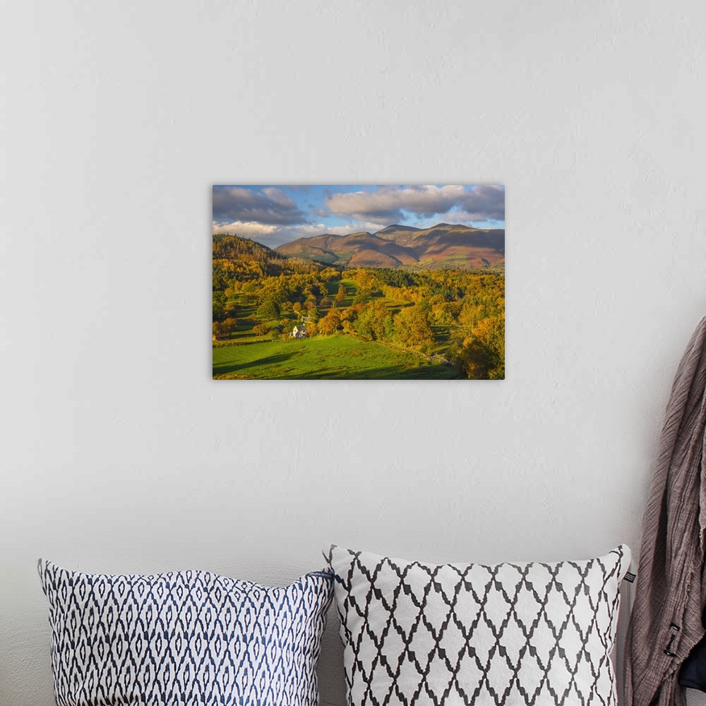 A bohemian room featuring UK, England, Cumbria, Lake District, Derwentwater, farm house with Skiddaw mountain above Keswick...