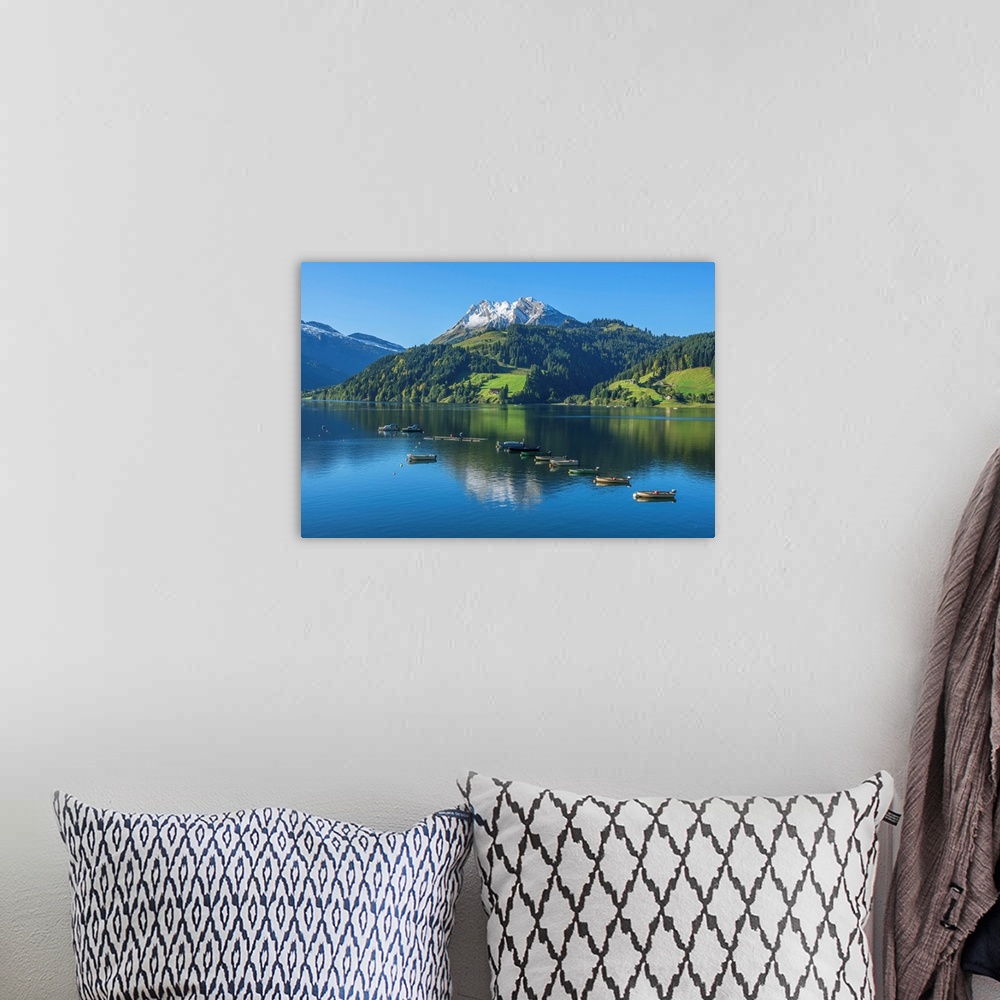 A bohemian room featuring Fisher Boats On Lake Wagital With Fluebrig Mountain In The Glarner Alps At Fall, Innerthal, Schwy...