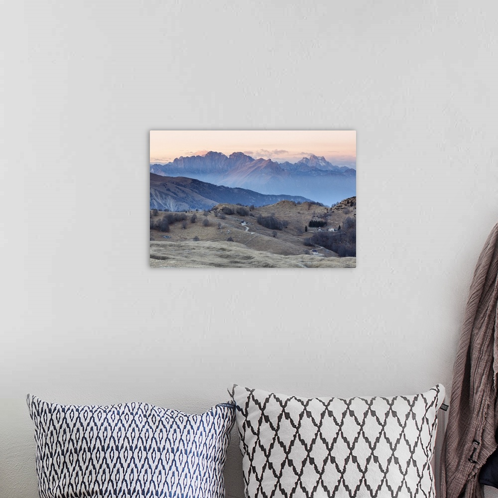 A bohemian room featuring Europe, Italy, Veneto, Treviso, Cansiglio. View towards the Dolomites from mount Pizzoc at sunset.