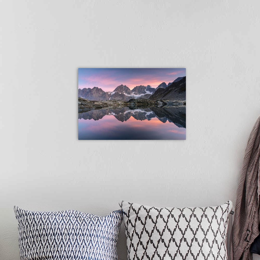 A bohemian room featuring Lake of Forbici during sunrise and in background Bernina Group, Valmalenco, Valtellina, Sondrio P...