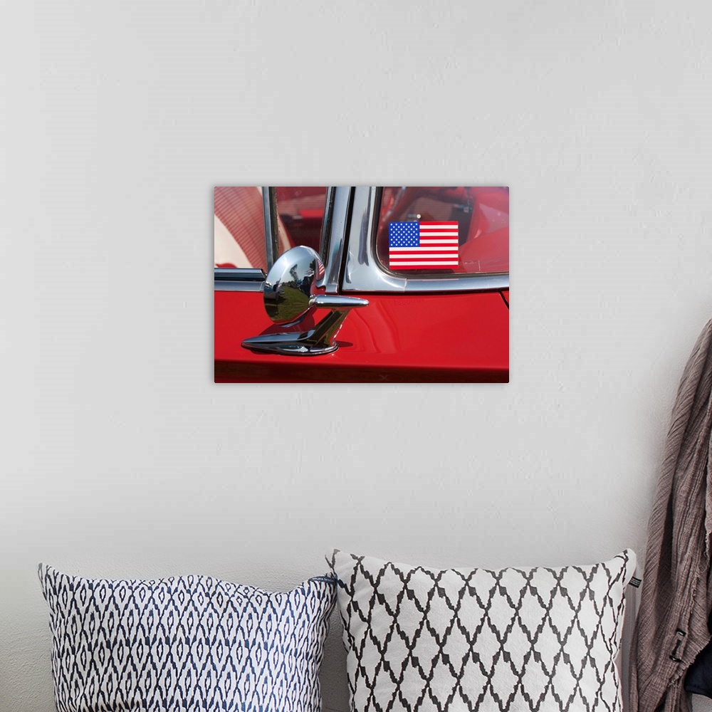 A bohemian room featuring USA, Massachusetts, Cape Ann, Gloucester, antique car show, US flag sticker on windshield of red car