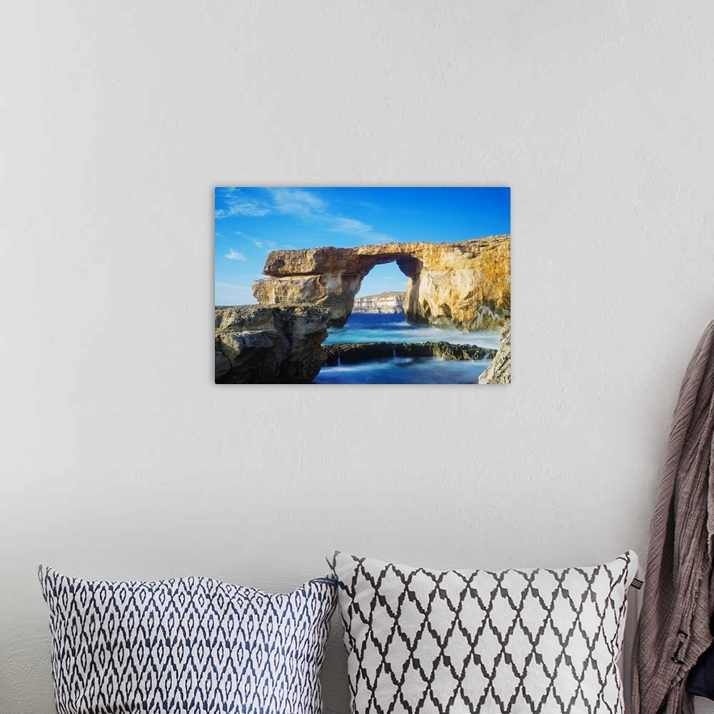 A bohemian room featuring Mediterranean Europe, Malta, Gozo Island, Dwerja Bay, The Azure Window natural arch.