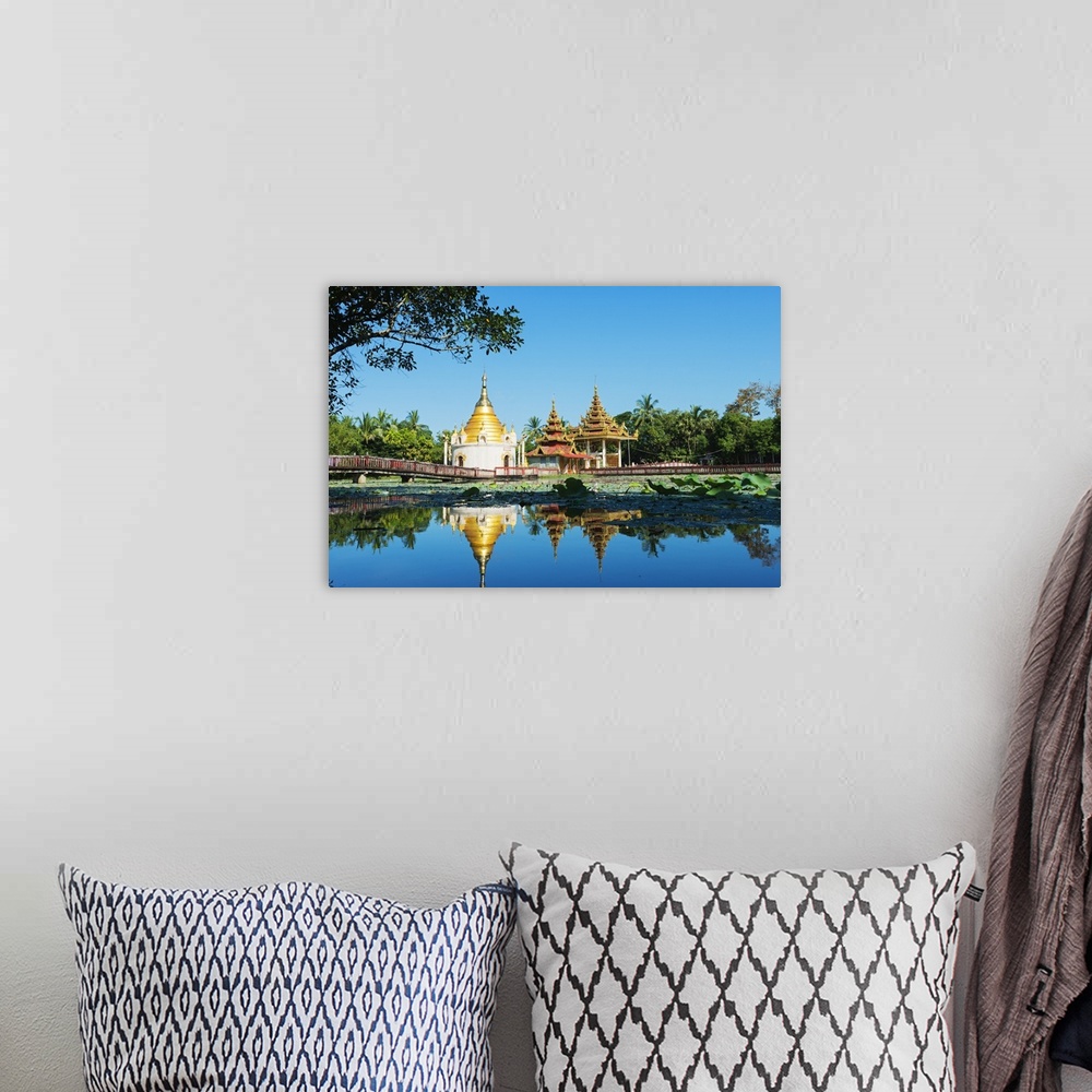 A bohemian room featuring South East Asia, Myanmar, Bago, lakeside pagodas.