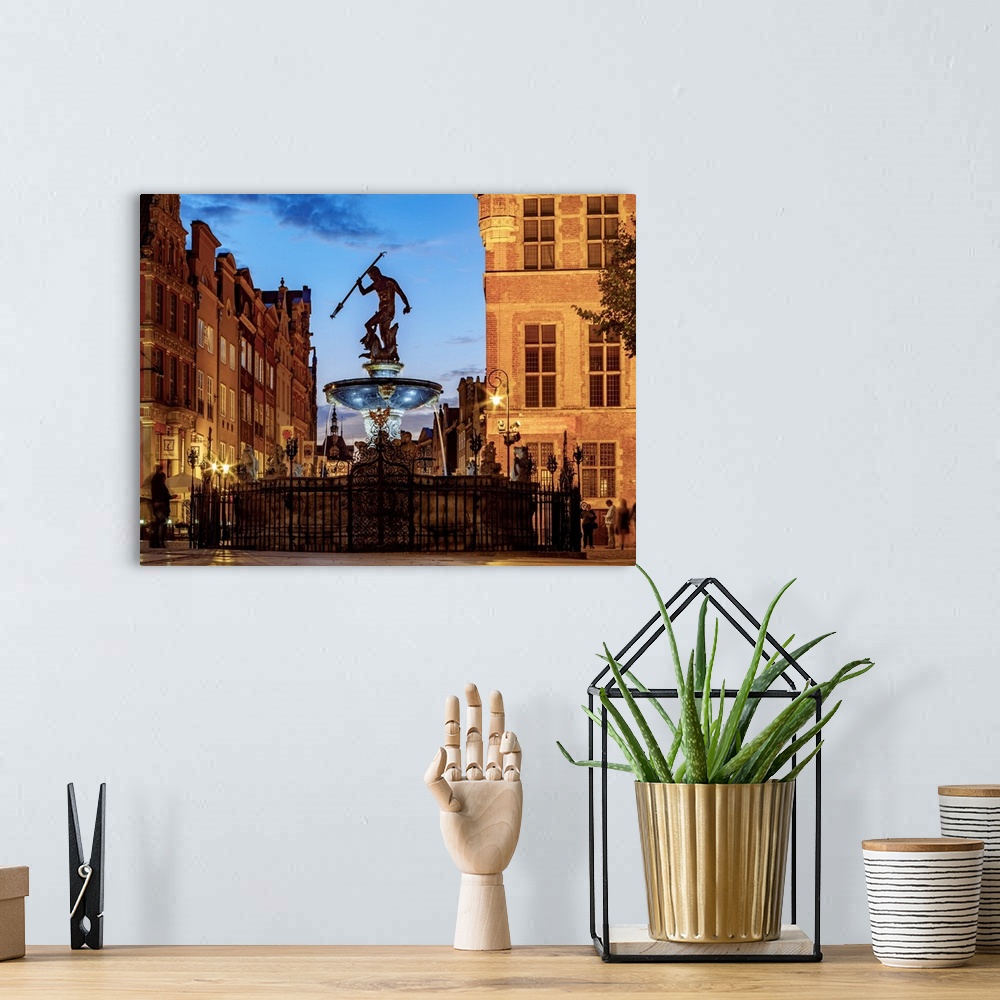 A bohemian room featuring Poland, Pomeranian Voivodeship, Gdansk, Old Town, Neptune's Fountain at twilight.