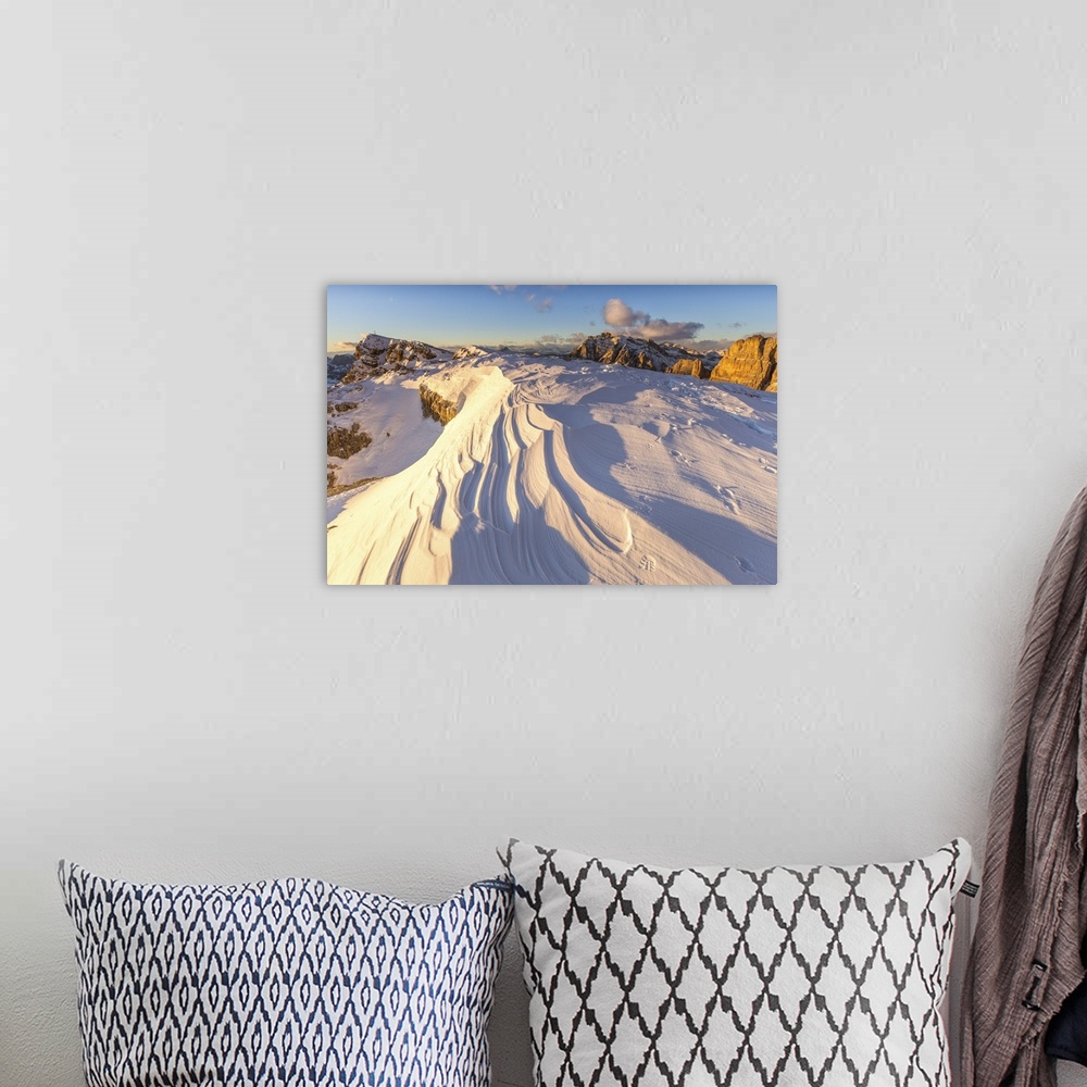 A bohemian room featuring Snow waves between rocks, Mount Lagazuoi, Cortina d'Ampezzo, Belluno district, Veneto, Italy, Eur...