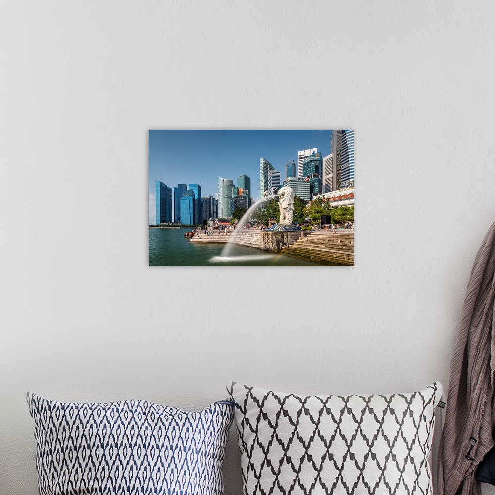 A bohemian room featuring The Merlion statue with city skyline in the background, Marina Bay, Singapore.