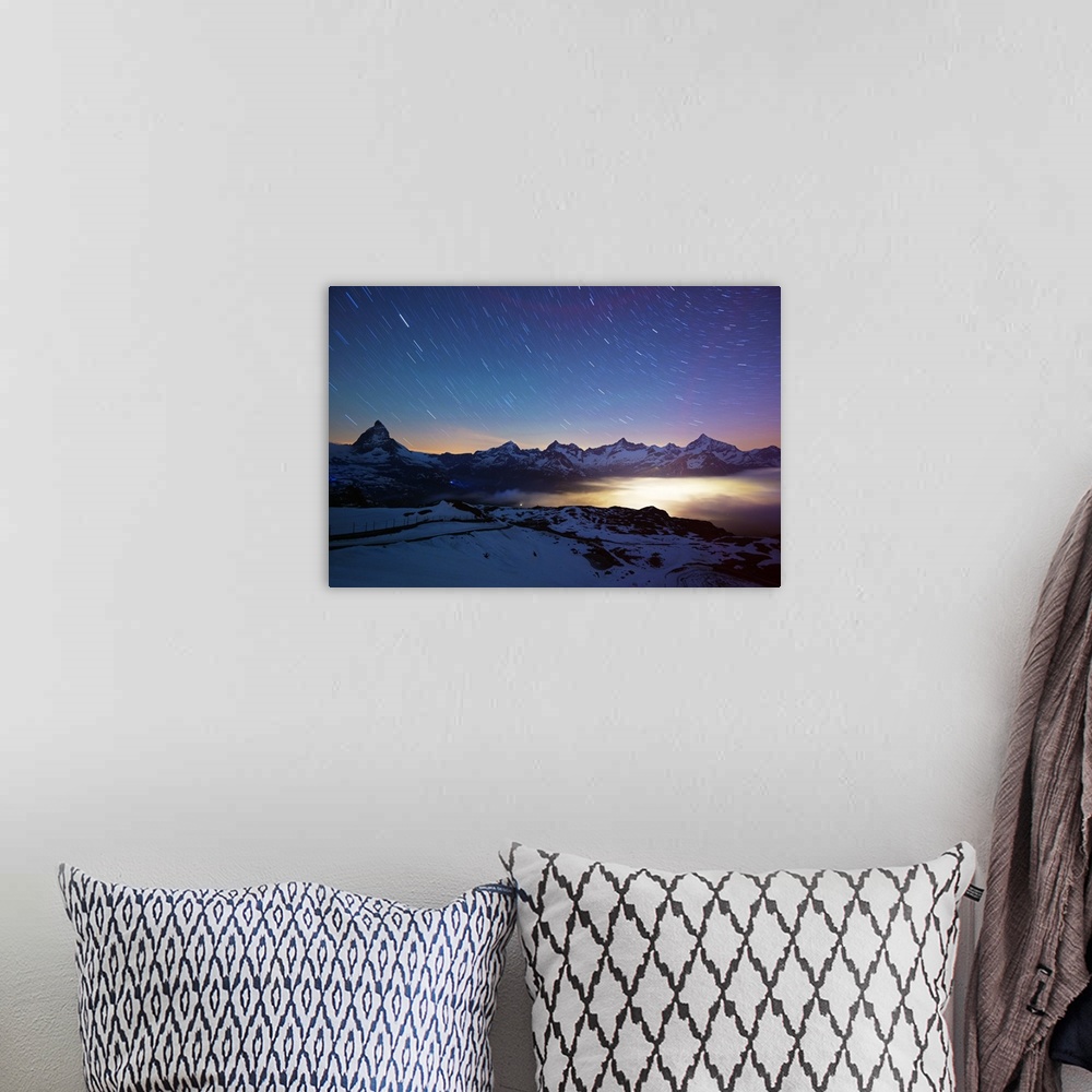 A bohemian room featuring Europe, Valais, Swiss Alps, Switzerland, Zermatt, The Matterhorn (4478m) and town lights.