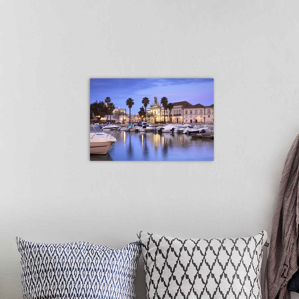 A bohemian room featuring View of Arco da Vila Across The Harbour, Faro, Eastern Algarve, Algarve, Portugal, Europe.