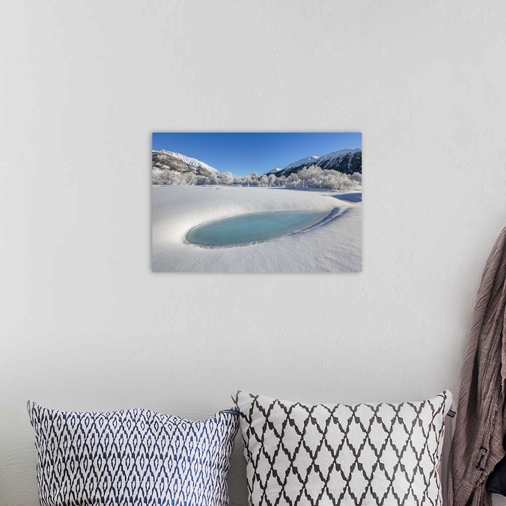 A bohemian room featuring Winter landscape with trees covered in hoarfrost and frozen pond. Celerina, Engadin, Graubunden, ...