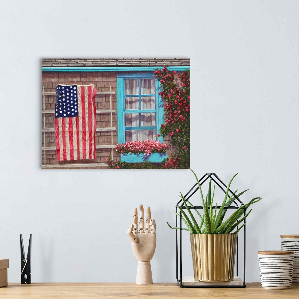 A bohemian room featuring American flag on siding of house next to a window with window flower box.