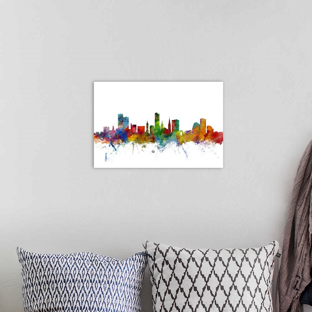 A bohemian room featuring Contemporary piece of artwork of the Leicester skyline made of colorful paint splashes.