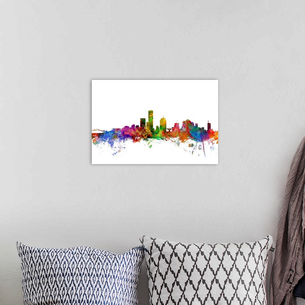 A bohemian room featuring Watercolor artwork of the Milwaukee skyline against a white background.