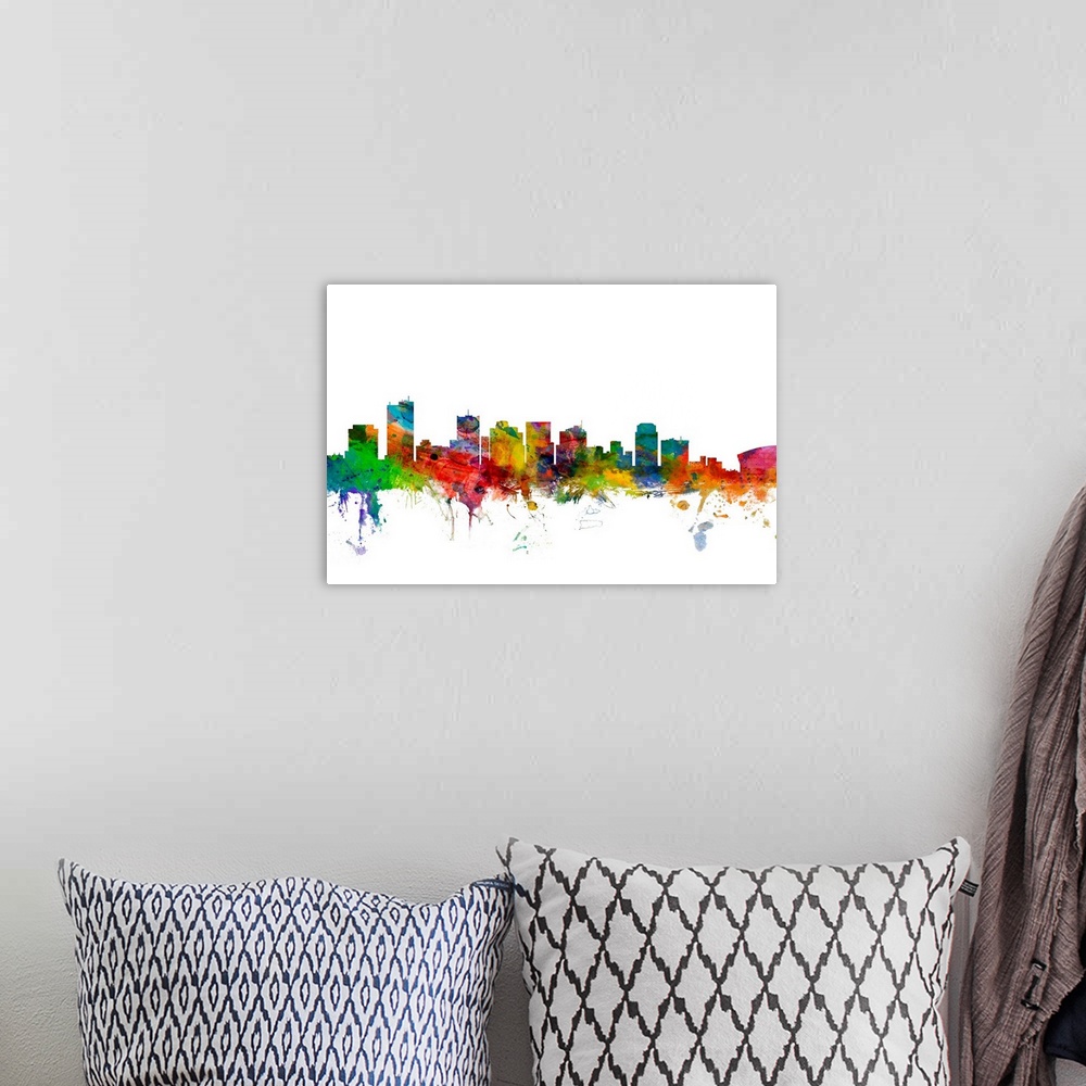 A bohemian room featuring Watercolor artwork of the Phoenix skyline against a white background.