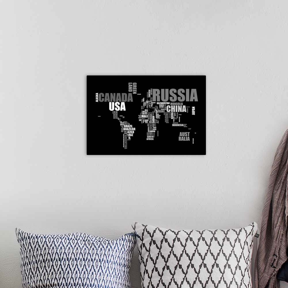 A bohemian room featuring Huge, horizontal, typography canvas art of the world map made up of the names of each country. On...