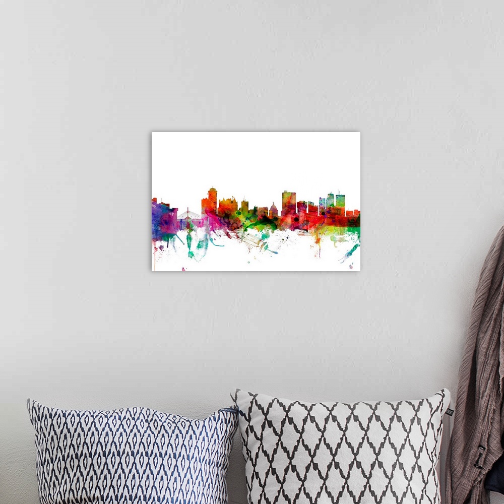 A bohemian room featuring Watercolor artwork of the Winnipeg skyline against a white background.