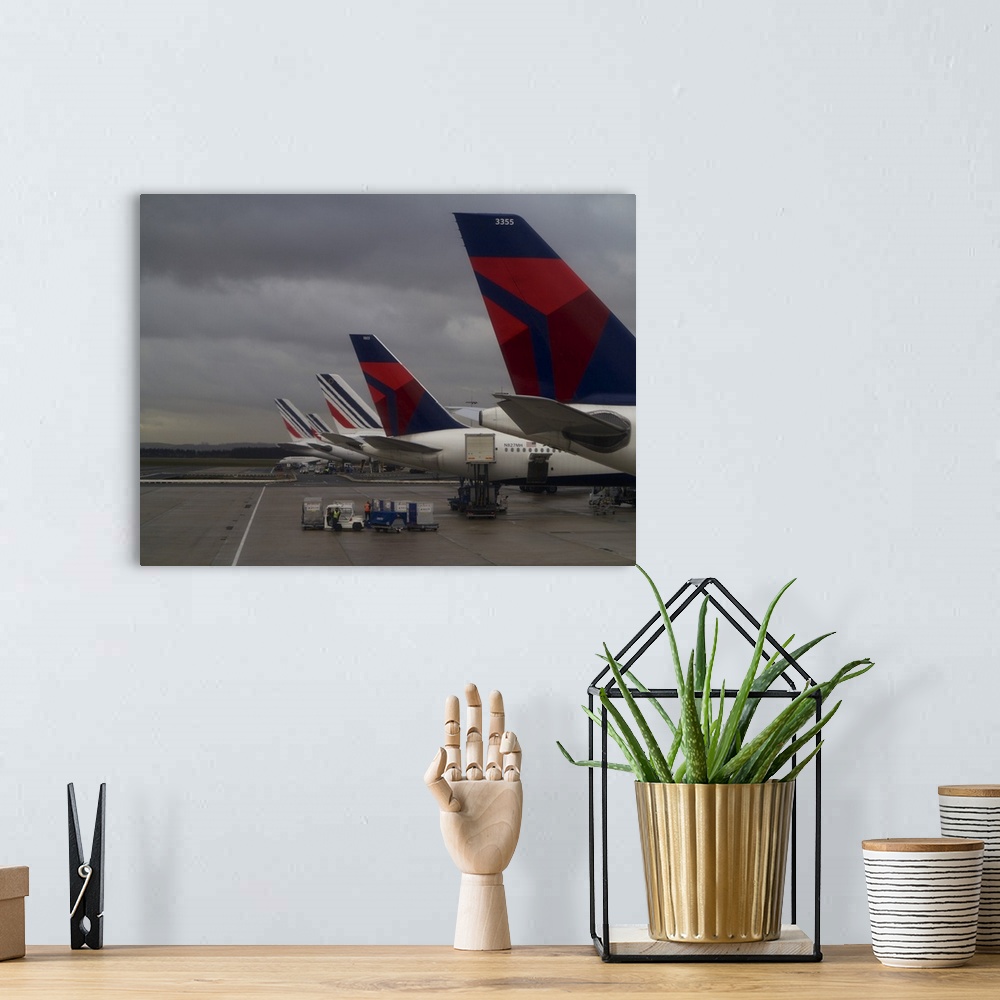 A bohemian room featuring Row of Planes on a Tarmac