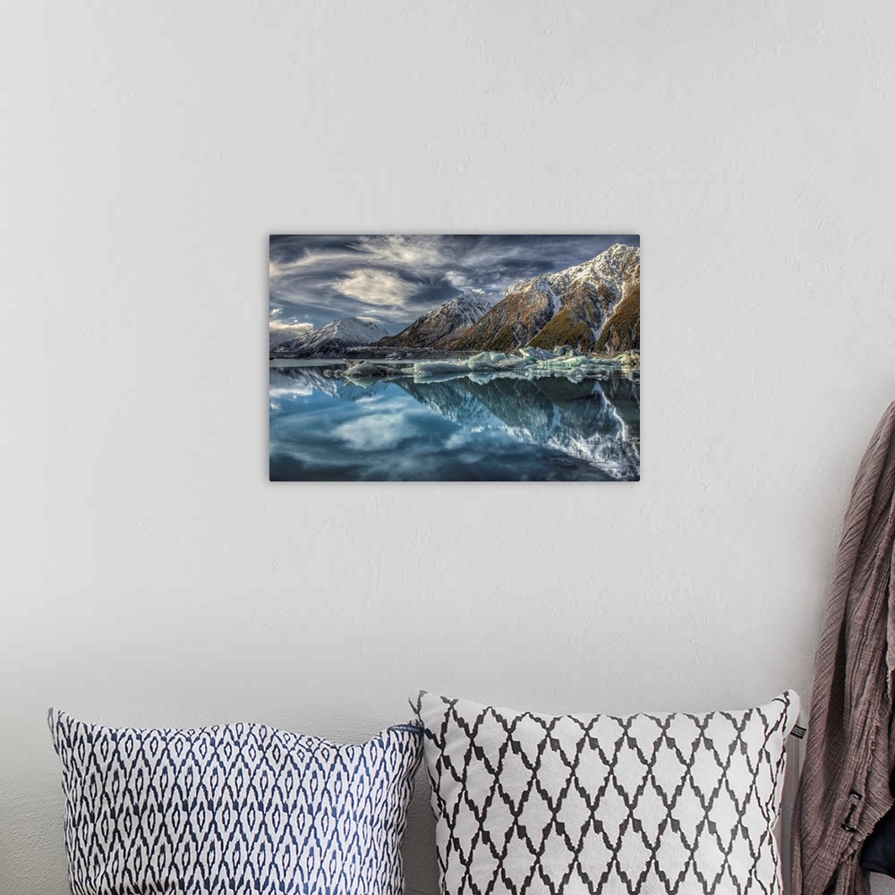 A bohemian room featuring Mirror image, reflection of clouds, peaks and icebergs in Tasman Glacier Lake, Mount Cook Nationa...