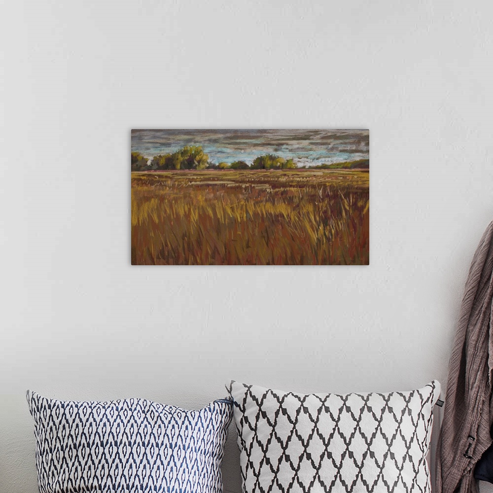 A bohemian room featuring Pastel landscape painting of pastoral countryside with trees, fields and clouds.