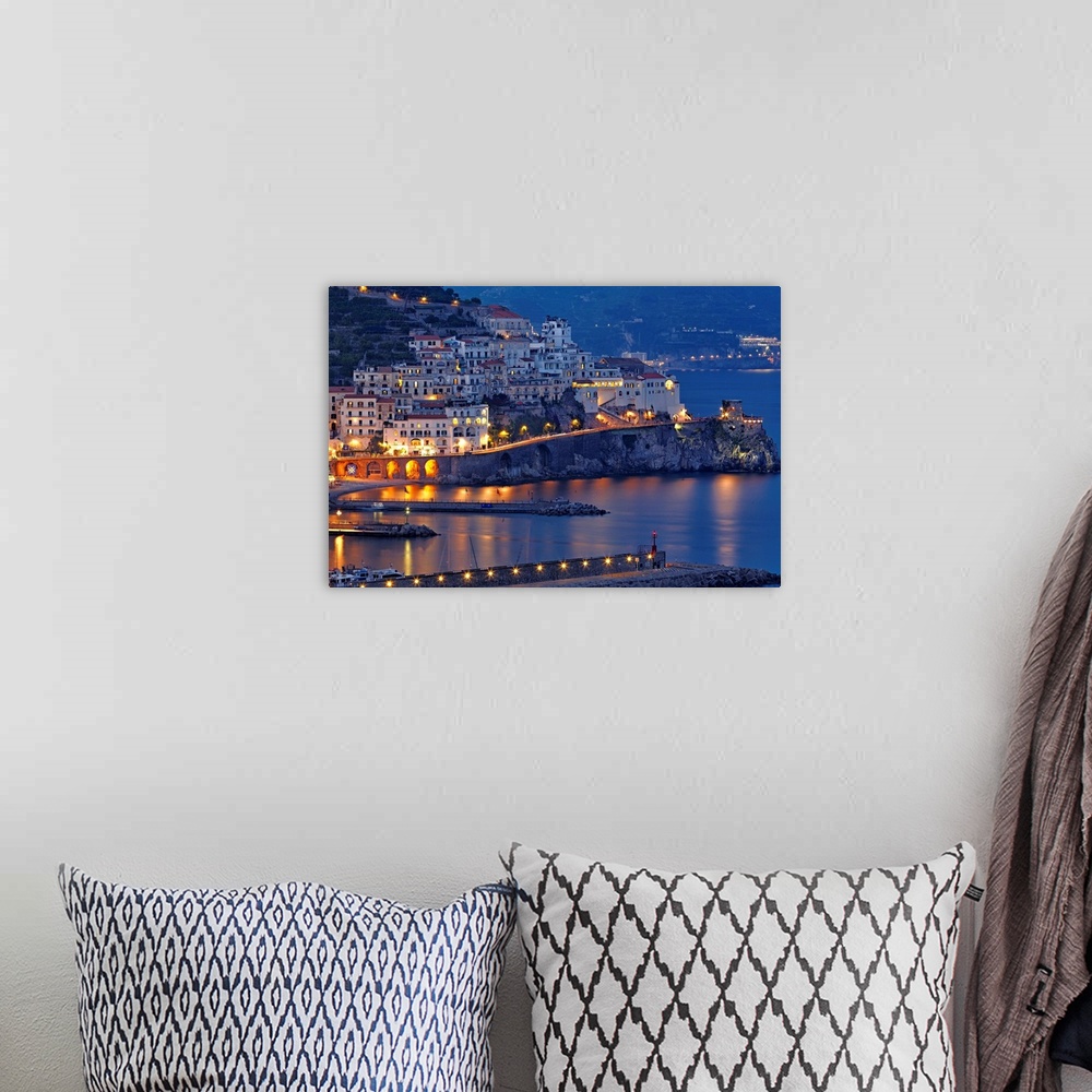 A bohemian room featuring High angle view of Amalfi Town at night,  Campania, Italy.