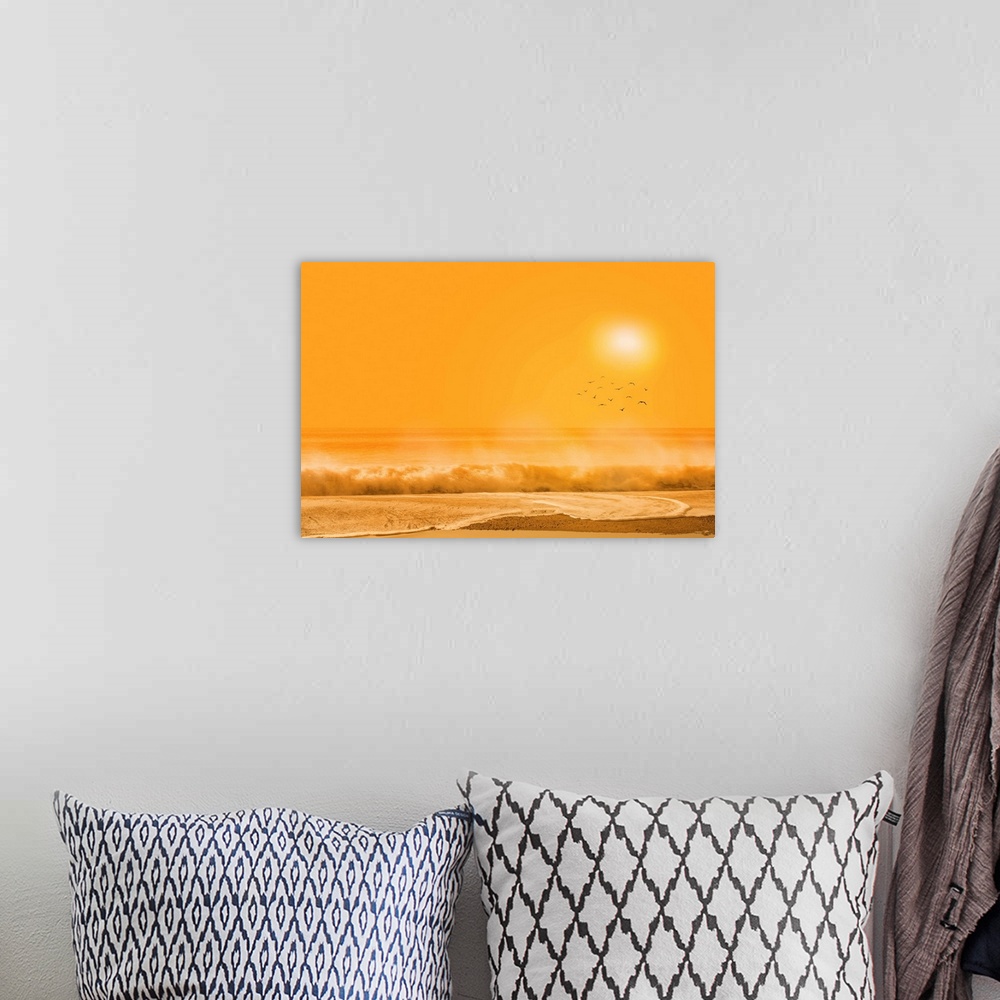 A bohemian room featuring A photograph of a beach scene under an orange sky.