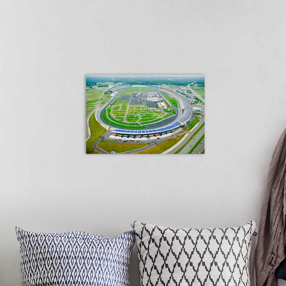 A bohemian room featuring Aerial view of North Carolina Speedway in Charlotte, NC