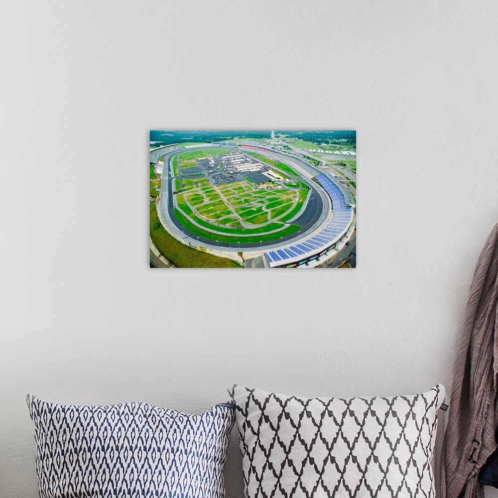 A bohemian room featuring Aerial view of North Carolina Speedway in Charlotte, NC