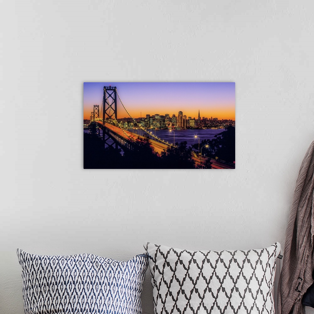 A bohemian room featuring Bay Bridge at dusk, San Francisco, California, USA