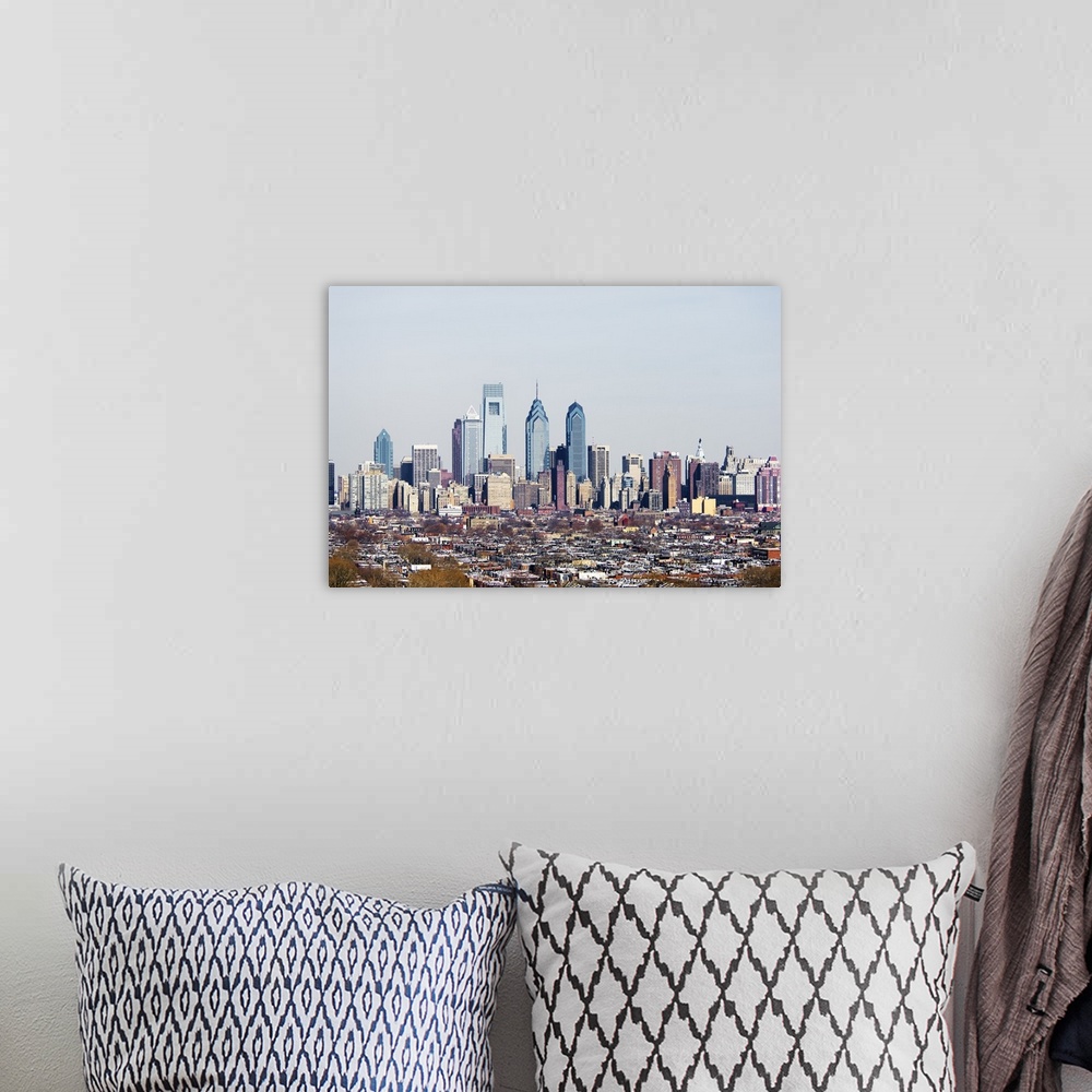 A bohemian room featuring Panoramic photograph of cityscape with tall buildings and skyscrapers.
