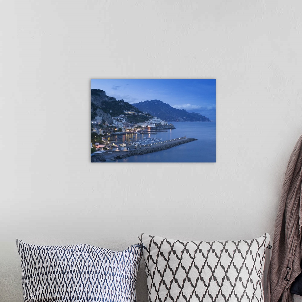 A bohemian room featuring Big, landscape photograph of lit buildings along a hillside on the Amalfi Coast, in Campania, Ita...