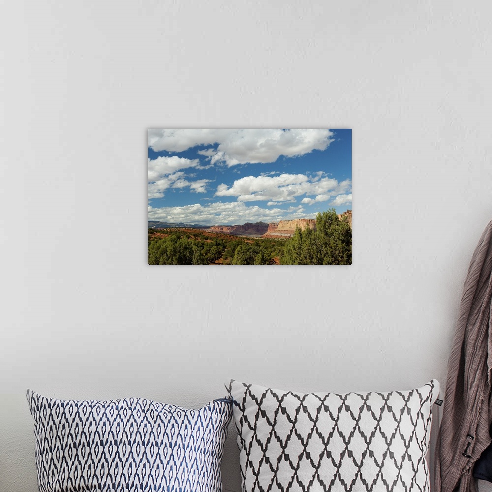 A bohemian room featuring Clouds over Capitol Reef National Park, Utah