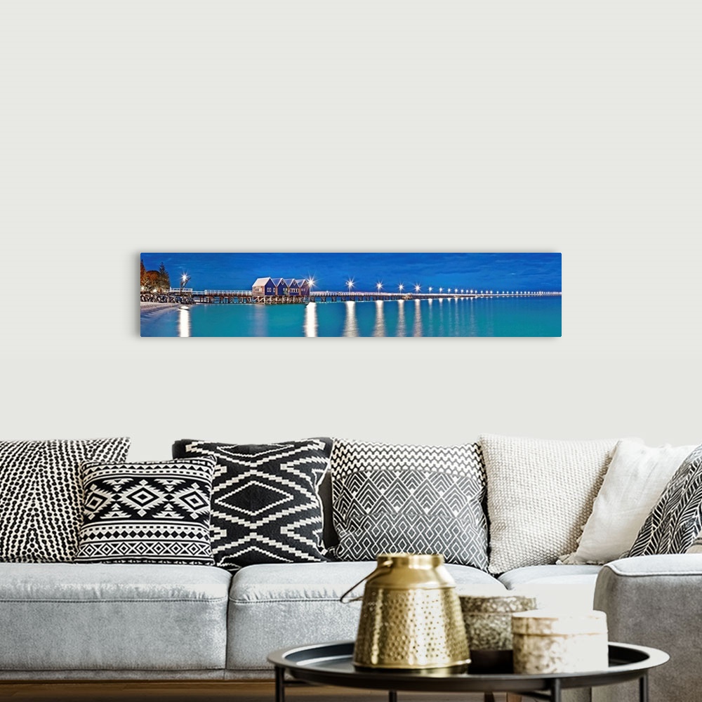 A bohemian room featuring Illuminated pier over the Pacific Ocean, Busselton Jetty, Western Australia, Australia.