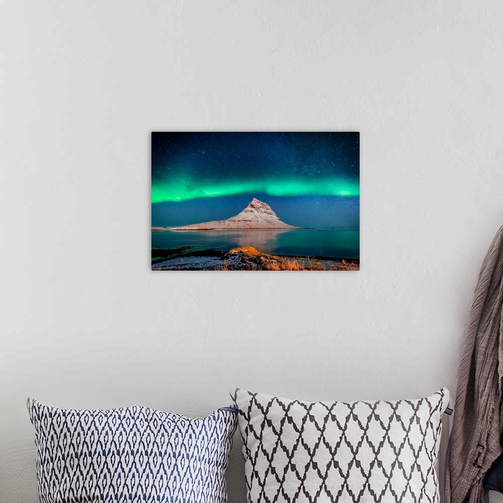 A bohemian room featuring Aurora borealis or northern lights with the milky way galaxy, mt. Kirkjufell, grundarfjordur, sna...