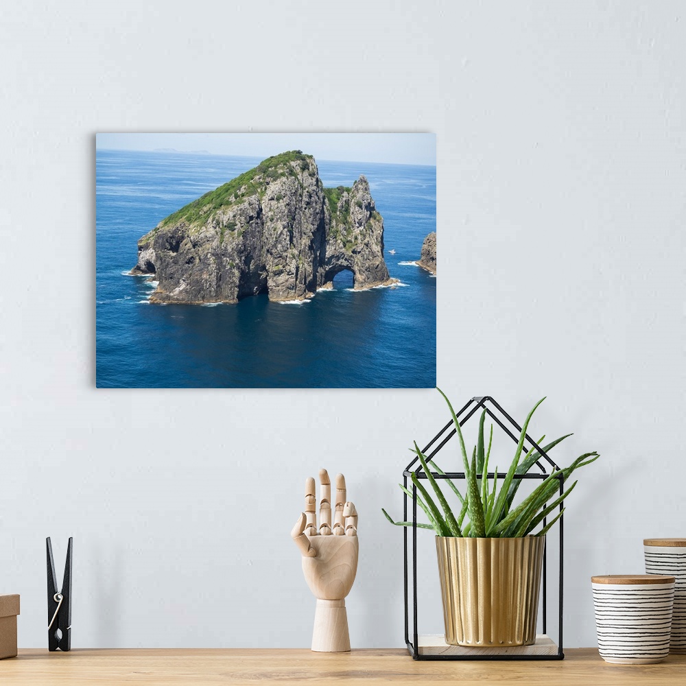A bohemian room featuring Rock formations in the sea, Motukokako Island, Bay of Islands, Northland, North Island, New Zealand.