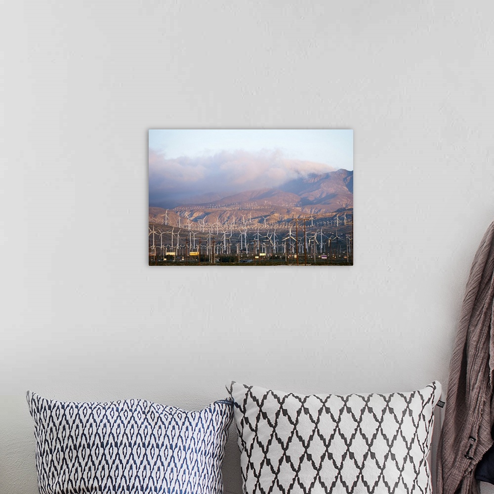 A bohemian room featuring Wind turbines with mountains in the background, Riverside County, California