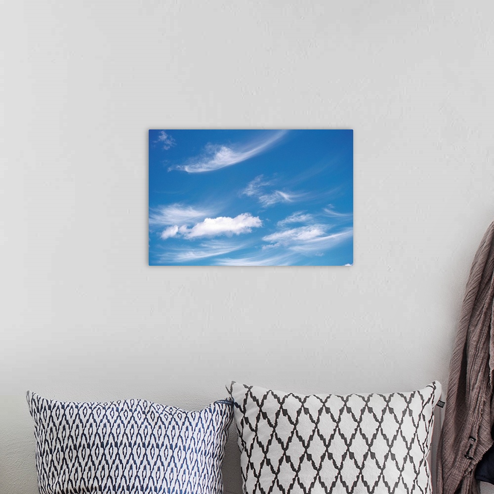 A bohemian room featuring Wispy Clouds in Sky
