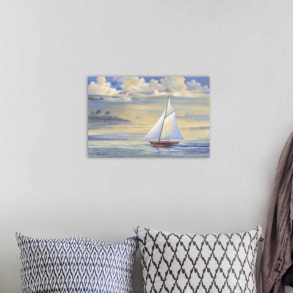 A bohemian room featuring Contemporary painting of a sailboat in the bay at sunrise with large clouds overhead.