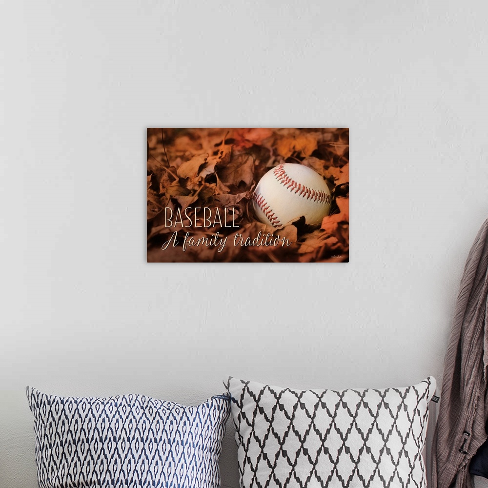 A bohemian room featuring Image of a baseball resting on fallen fall leaves.