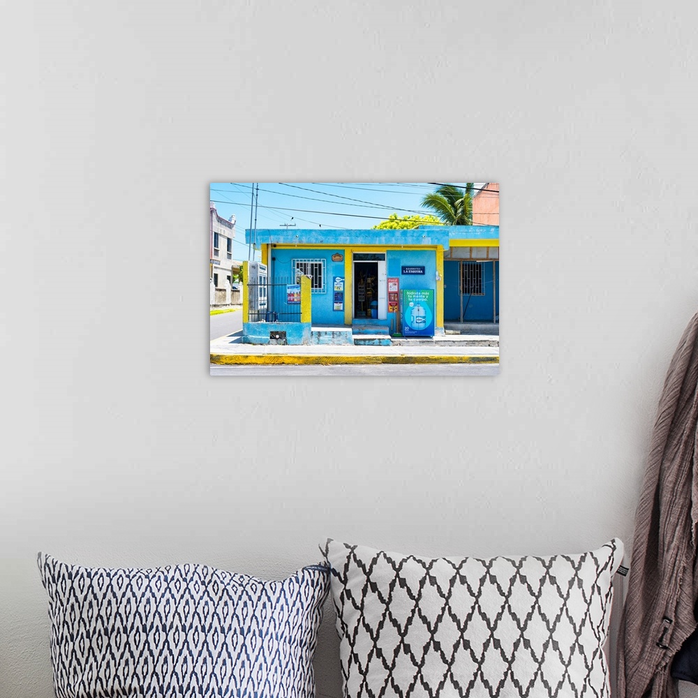 A bohemian room featuring Photograph of a blue and yellow supermarket in Cancun, Mexico. From the Viva Mexico Collection.