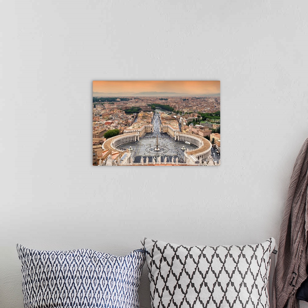 A bohemian room featuring It's a view of the Vatican City at sunset.