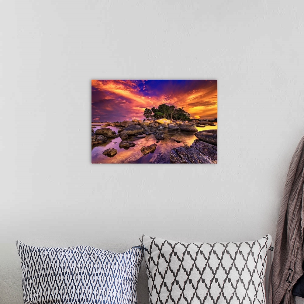 A bohemian room featuring Photograph of sunset sky lit up in a blaze of sunlight.