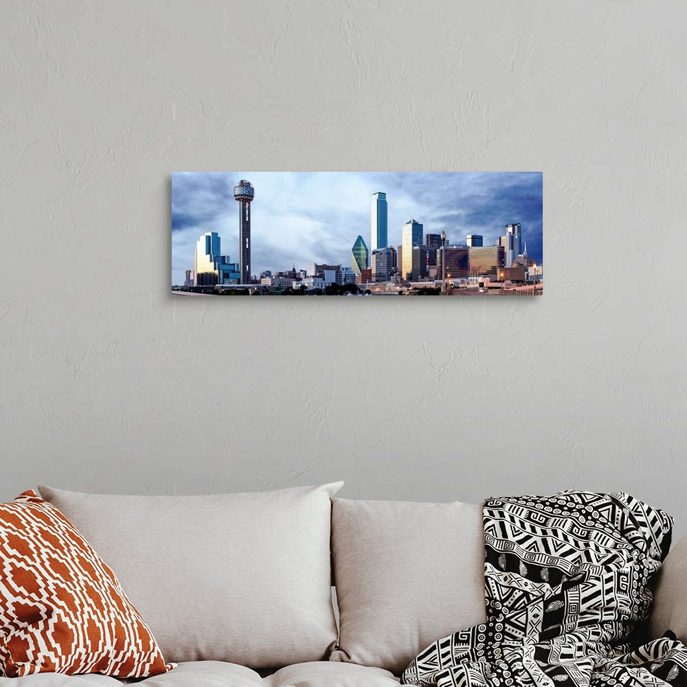 A bohemian room featuring A horizontal image of the city of Dallas, Texas.